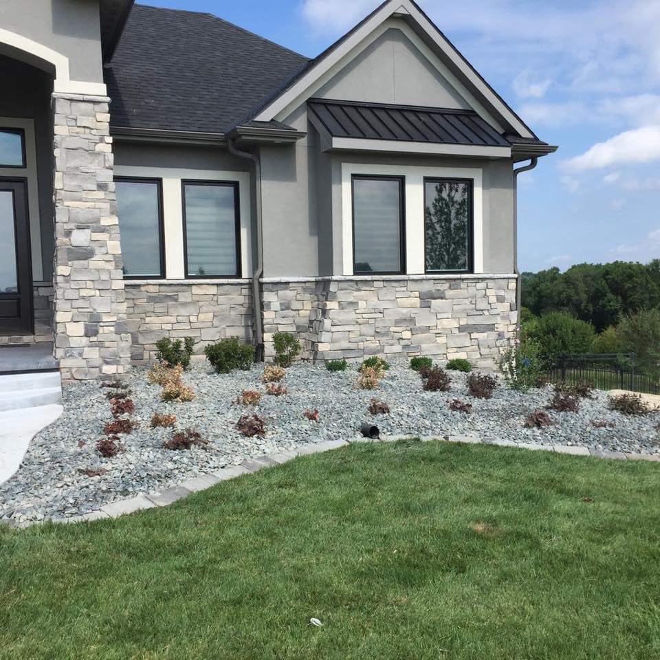 Residential landscaping and hardscaping project completed by Pat's Irish Green